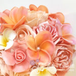 Bouquet sposa tema mare frangipani rosa pesca